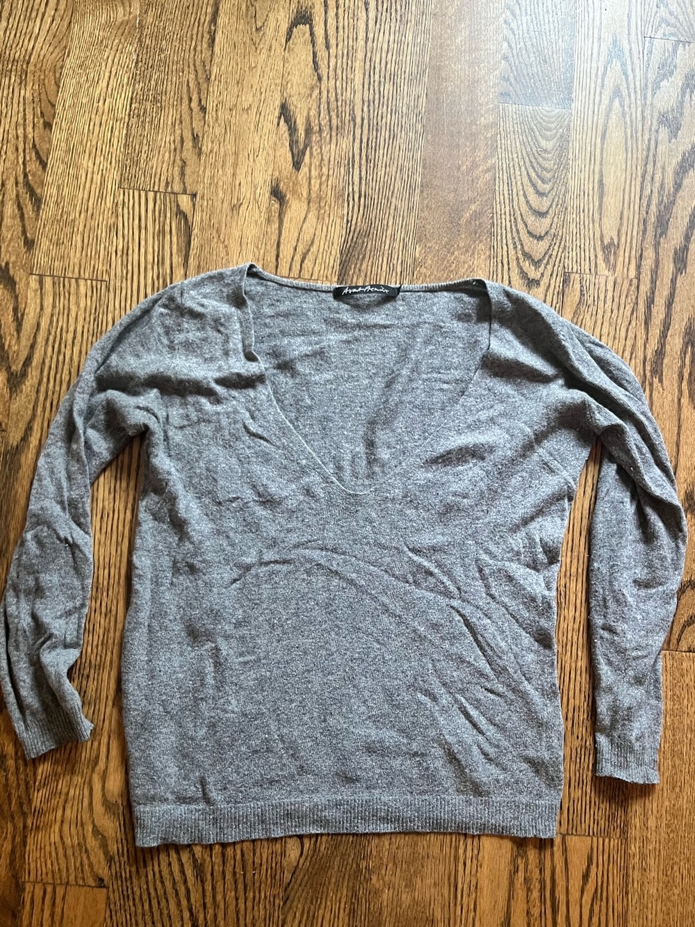 Cotton/cashmere/mix deep-v grey sweater. Fits like a medium.